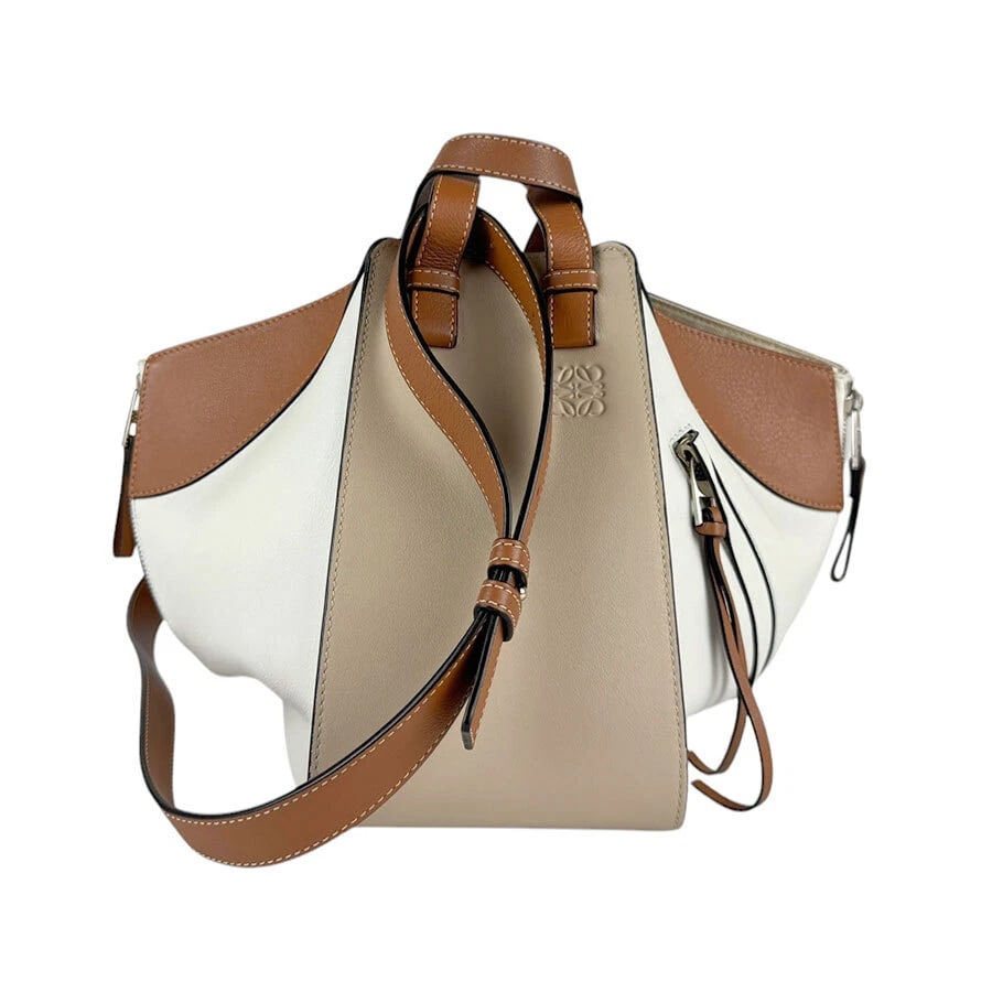 LOEWE HAMMOCK SHOULDER BAG: LOEWE Hammock Shoulder Bag Brand: LOEWE Type: Shoulder Bag Material: Leather Color: White X Beige X Brown Size: W:5.5inx H:9.1inx D:10.6in Handle Length:10.6in Shoulder Length: 41.7in Accessories
