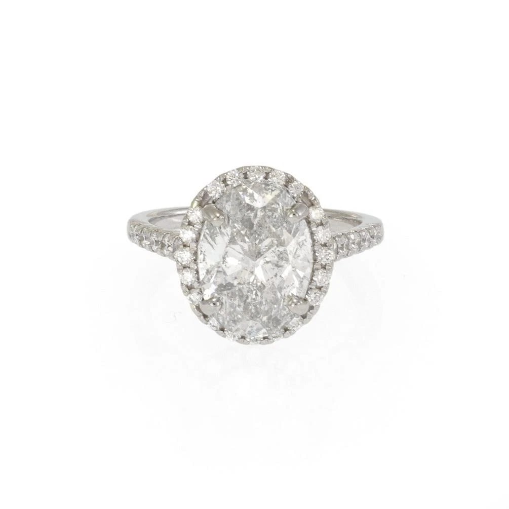 HALO DIAMOND PLATINUM OVAL TOP ENGAGEMENT RING: Halo Diamond Platinum Oval Top Engagement Ring Brand: Unbranded Type: Ring Material: platinum Color: White Size: 6.5 US Accessories: None Accessories Notice: When purchasing pre-owned good