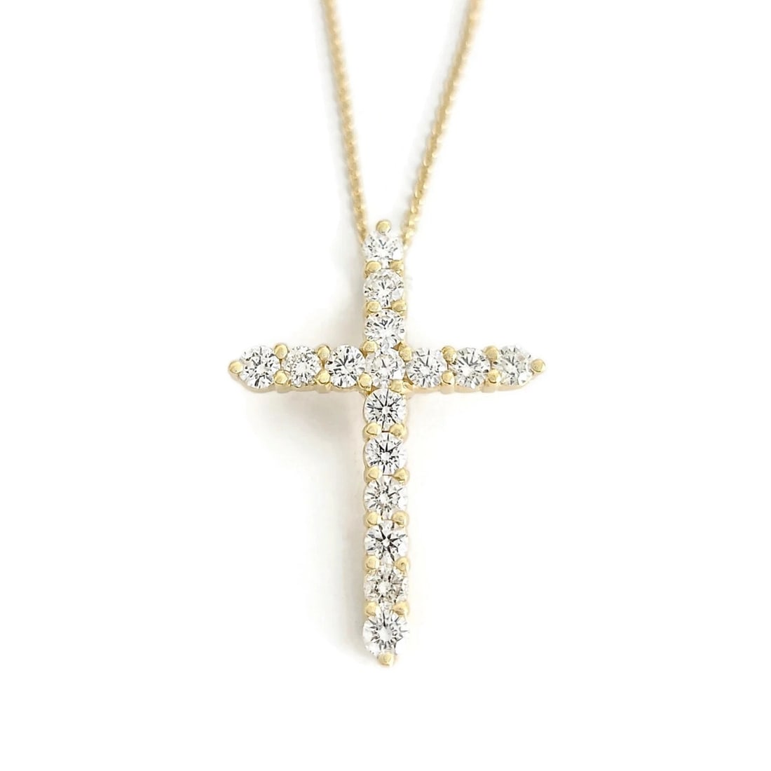DIAMOND CROSS PENDANT NECKLACE: Diamond Cross Pendant Necklace Brand: Unbranded Type: Necklace Material: 14K yellow gold Color: Gold Size: Length: 16 inches Pendant: 1.25 inch x 23.2 mm Accessories: None Accessories Noti