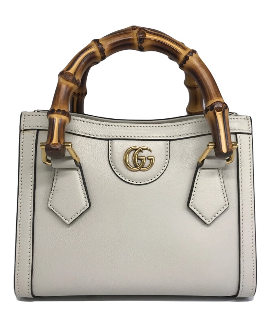 GUCCI DIANA MINI TOTE BAG HANDBAG: GUCCI Diana Mini Tote Bag Handbag Brand: GUCCI Type: Handbag Material: None Color: Ivory Size: H:16cm / W:19.5cm / D:7cm [ Handle size ] 10cm Accessories: None Accessories Notice: When pur