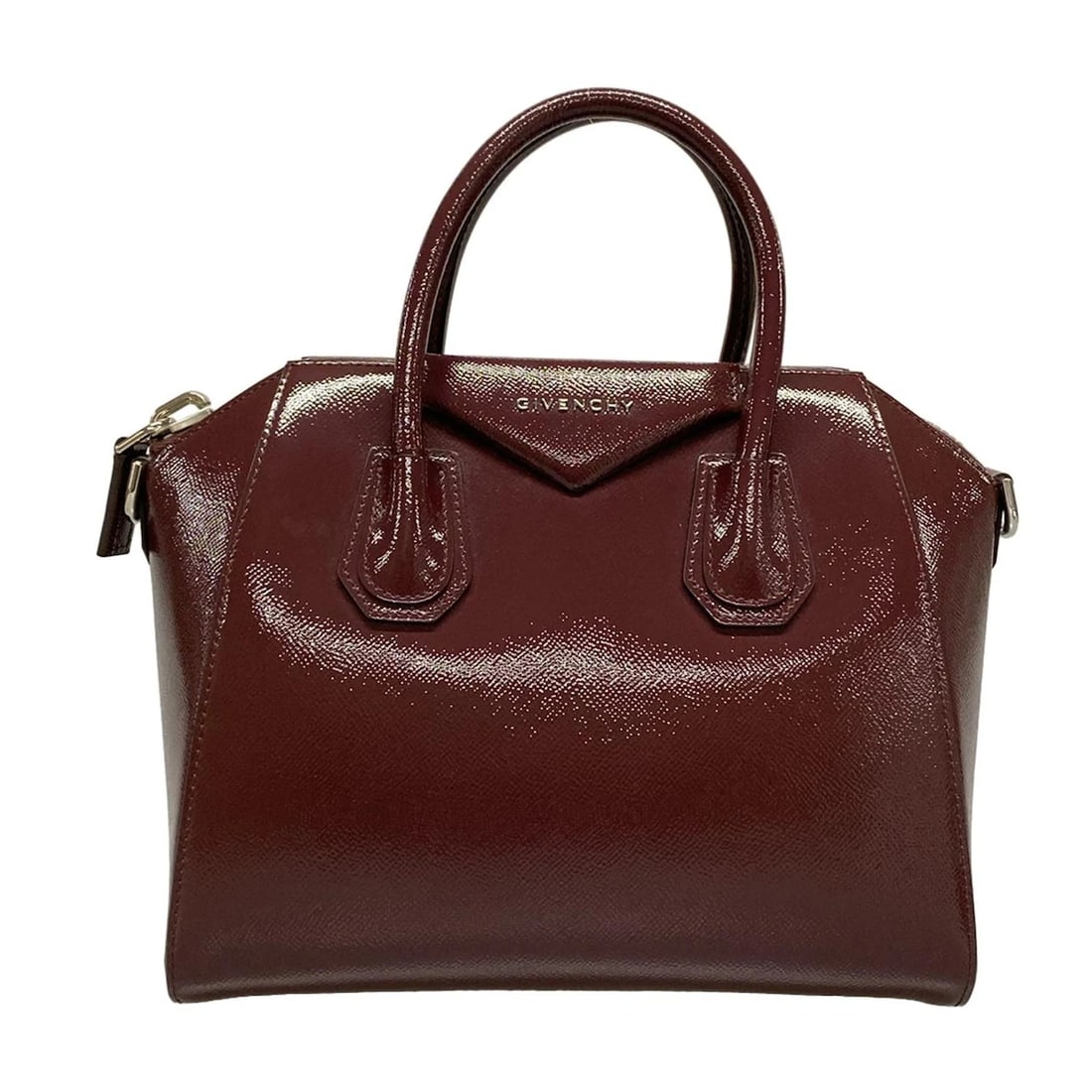 GIVENCHY ANTIGONA SMALL RED PATENT HANDBAG: GIVENCHY Antigona Small red Patent Handbag Brand: GIVENCHY Type: Handbag Exterior Material: Patent Leather Exterior Color: oxblood red Size: Height : 9.06 inch (23 cm) Width : 11.02 inch (28 cm) -