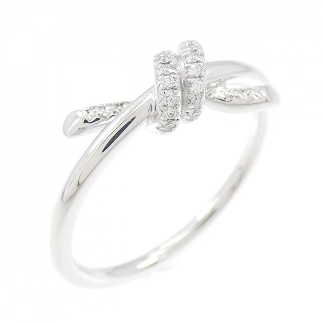 TIFFANY KNOT RING: Tiffany Knot Ring Brand: Tiffany Type: Ring Material: 750 White Gold Color: None Size: 6.5 (US size) Accessories: None Accessories Notice: When purchasing pre-owned goods, please refer to