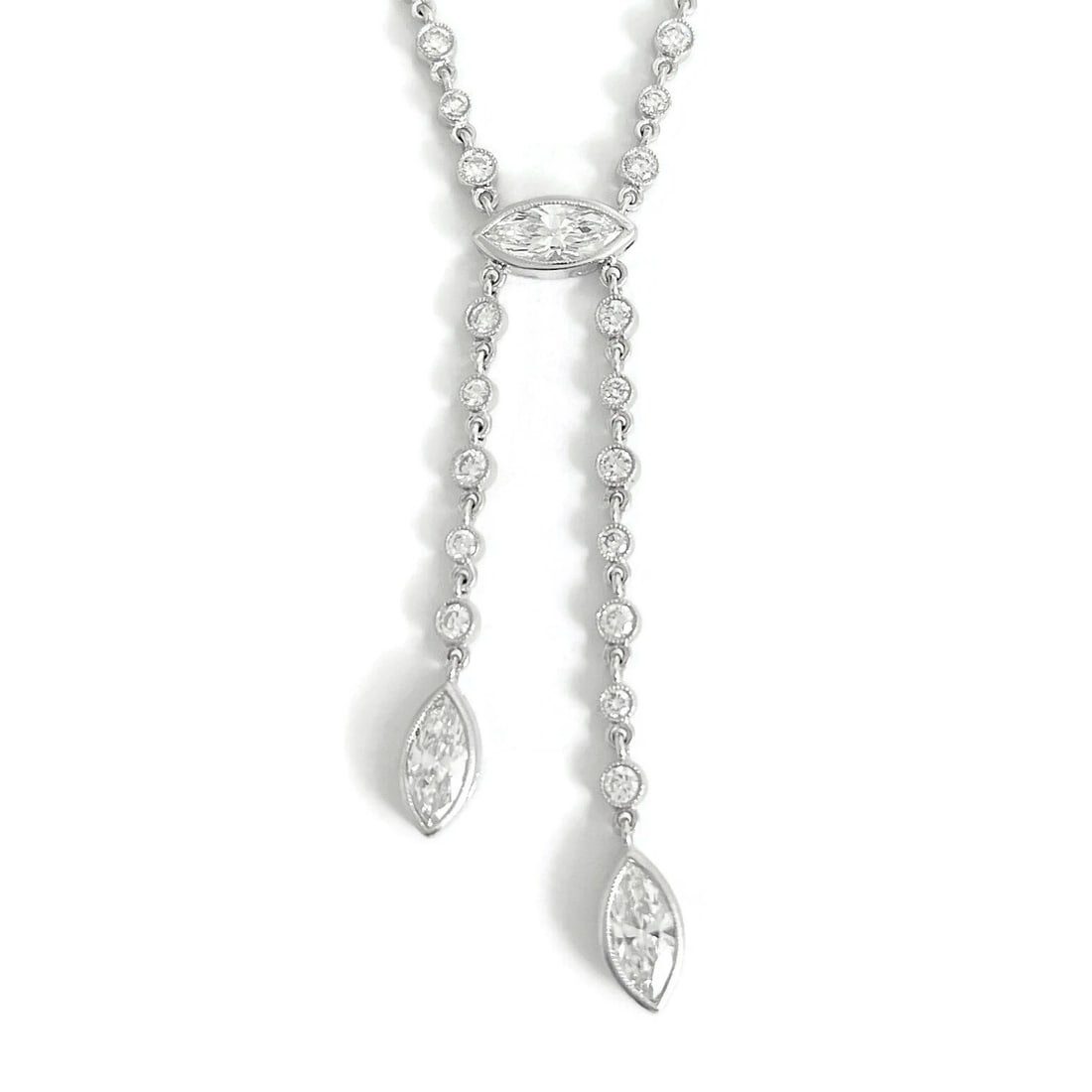 MARQUISE DIAMOND PENDANT LARIAT Y-DROP NECKLACE: Marquise Diamond Pendant Lariat Y-Drop Necklace Brand: Unbranded Type: Necklace Material: 18K white gold Color: Silver Size: Length: 16.5 inches Pendant: 2-inch drop Accessories: None Acce