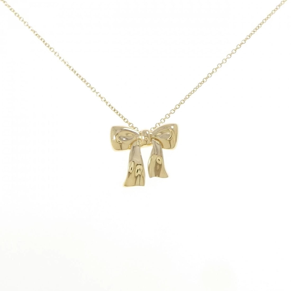 TIFFANY BLUE BOX BOW LARGE NECKLACE: Tiffany Blue Box Bow Large Necklace Brand: Tiffany Type: Necklace Material: 750 Yellow Gold Color: None Size: 38cm ActualSize Pendant top H x W: 13.7mmx15.3mm Chain Max. W: 1.1mm Accessories: None