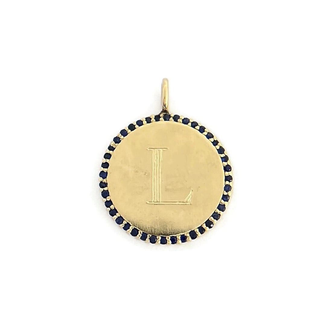 LETTER L INITIAL SAPPHIRE DISC PENDANT: Letter L Initial Sapphire Disc Pendant Brand: Unbranded Type: Pendant Material: 14K yellow gold Color: Gold Size: Measurements: 21.6 mm (with bale) x 16.8 mm Accessories: None Accessories