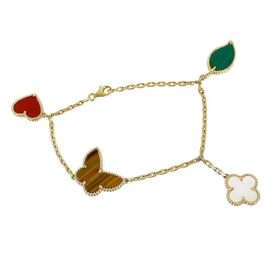 VAN CLEEF & ARPELS LUCKY ALHAMBRA BRACELET: Van Cleef & Arpels Lucky Alhambra Bracelet Brand: Van Cleef & Arpels Type: Bracelet Material: 18K Yellow Gold carnelian tiger's eye shell malachite Color: Gold Size: Heart motif:14.4mm×12.7mm Lea