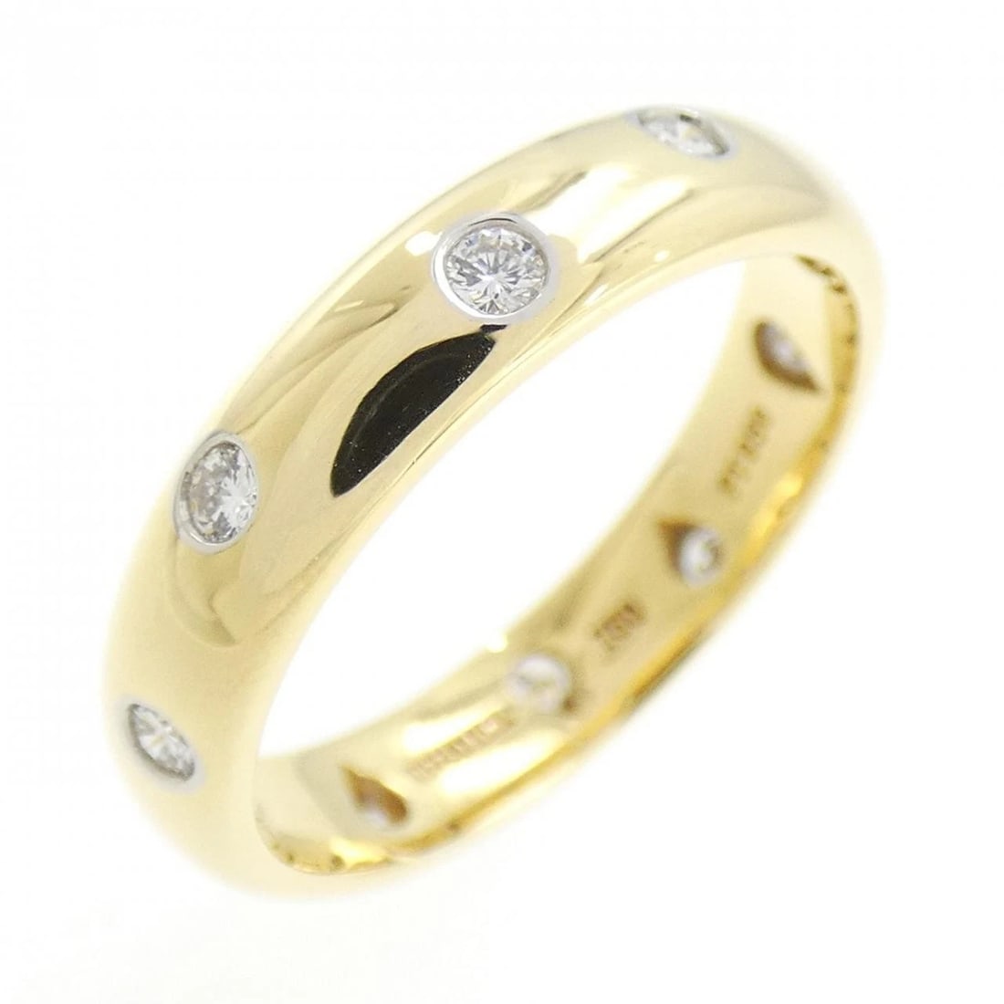 TIFFANY & CO. DOTS RING: Tiffany & Co. Dots Ring Brand: Tiffany Type: Ring Material: 750 Yellow Gold Platinum 950, Main Stone Creation Natural Color: None Size: 6.5 US Accessories: None Accessories Notice: When pu