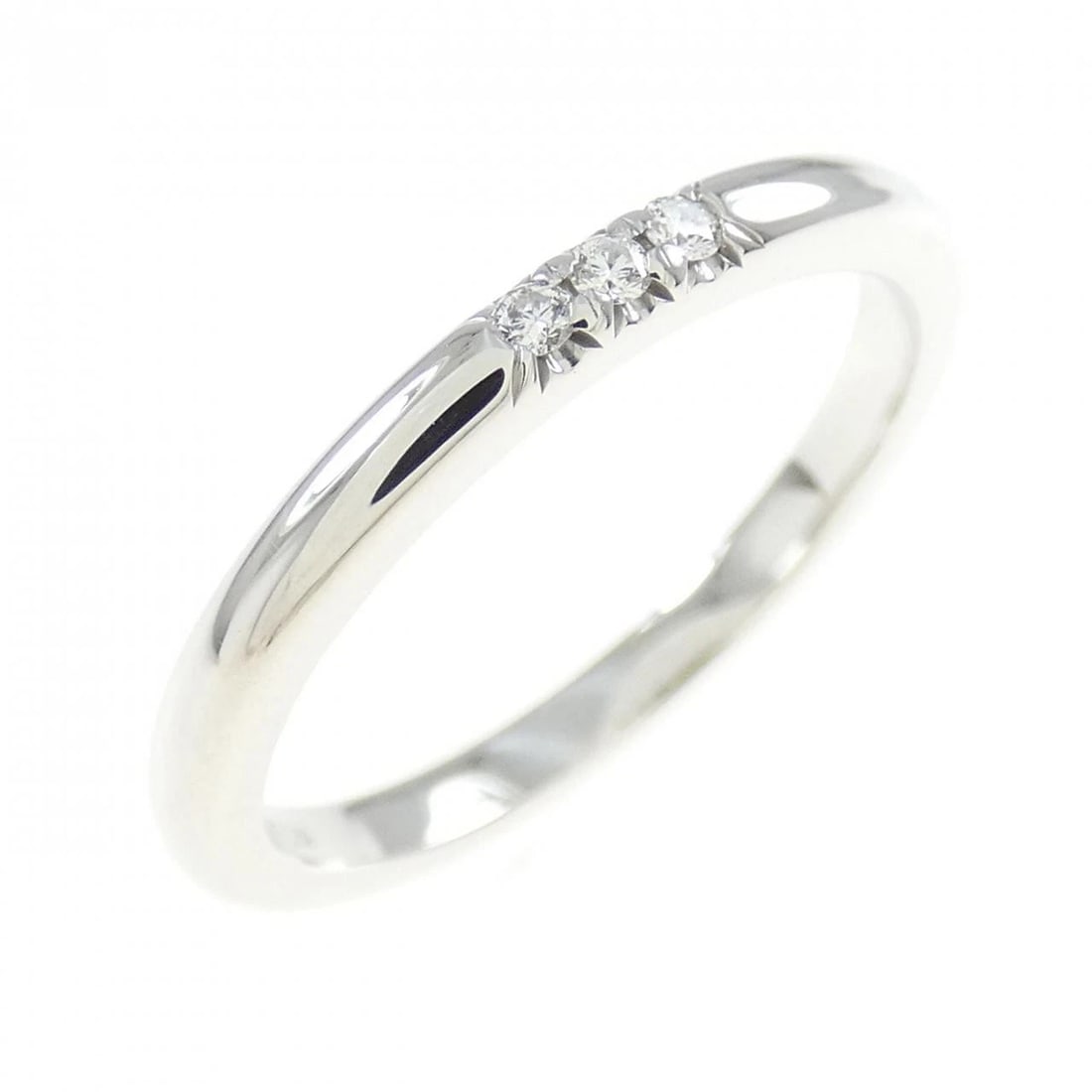 TIFFANY & CO. BAND RING: Tiffany & Co. band Ring Brand: Tiffany Type: Ring Material: Platinum 950, Main Stone Creation Natural Color: None Size: 5 US Accessories: None Accessories Notice: When purchasing pre-owned