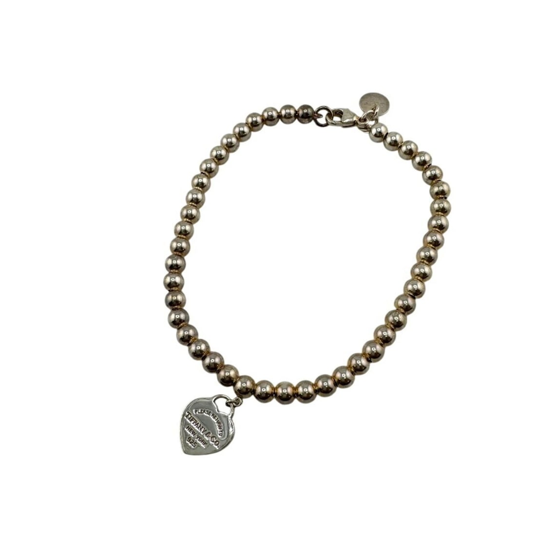 TIFFANY & CO. TIFFANY MINI HEART TAG BEADS: TIFFANY & Co. Tiffany Mini Heart Tag Beads Brand: Tiffany Type: Charm bracelet Material: Silver 925, Color: Silver Size: Length 17cm / 6.69'' Width 3mm / 0.11'' Total Length 17.5cm / 6.88'' Acces