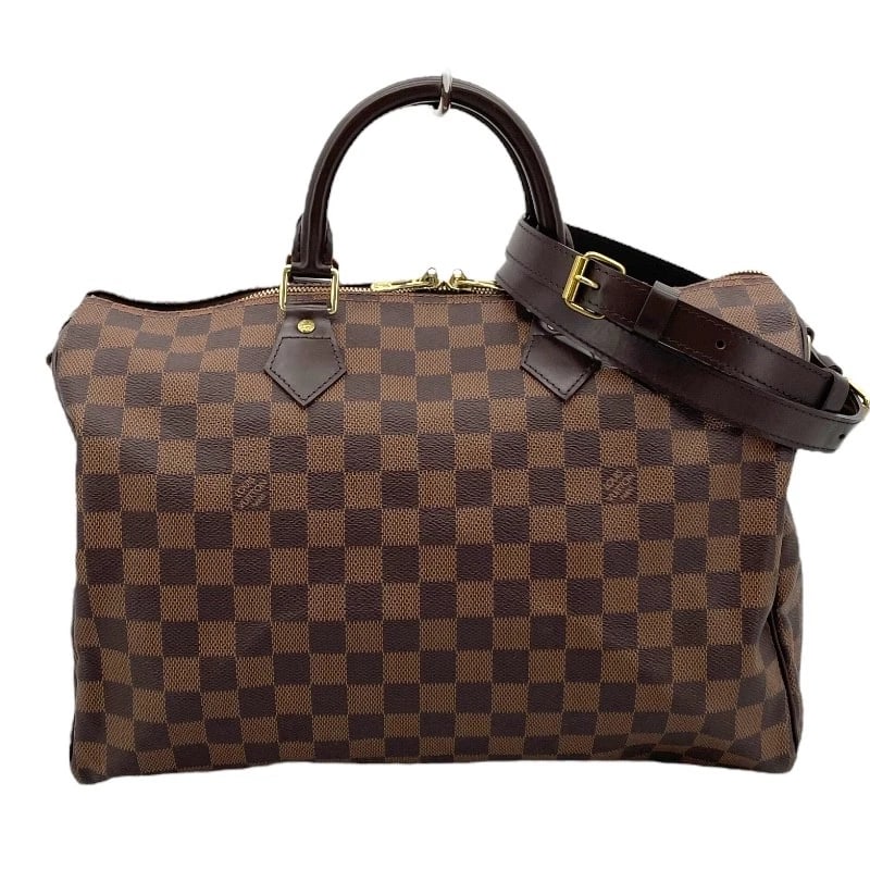 LOUIS VUITTON SPEEDY BANDOLIER 35 SHOULDER BAG: LOUIS VUITTON Speedy Bandolier 35 Shoulder Bag Brand: LOUIS VUITTON Type: Shoulder Bag Material: Damier Color: Brown Size: W13.8 x H8.7x D7.1inch Shoulder:43.3inch Accessories: None Access