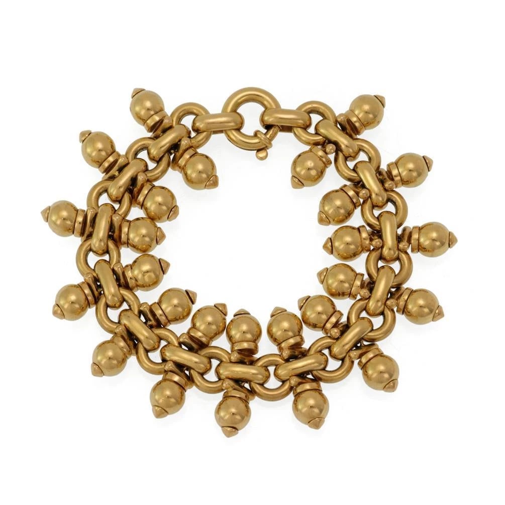 SHAKING BEAD CHARMS BRACELET: Shaking Bead Charms Bracelet Brand: Unbranded Type: Bracelet Material: 18k yellow gold, Color: Yellow Size: Measurement: 7.5" long x 1.11" wide x 0.30" high Accessories: None Accessories N