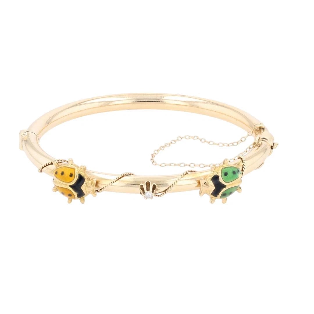DIAMOND ENAMELED LADY BUG BANGLE BRACELET: Diamond Enameled Lady Bug Bangle Bracelet Brand: Unbranded Type: Bracelet Material: 14k Yellow Gold, Main Stone Natural Color: None Size: Bracelet Measurement: 6.5" Length / 4.7mm - 12.1mm Width