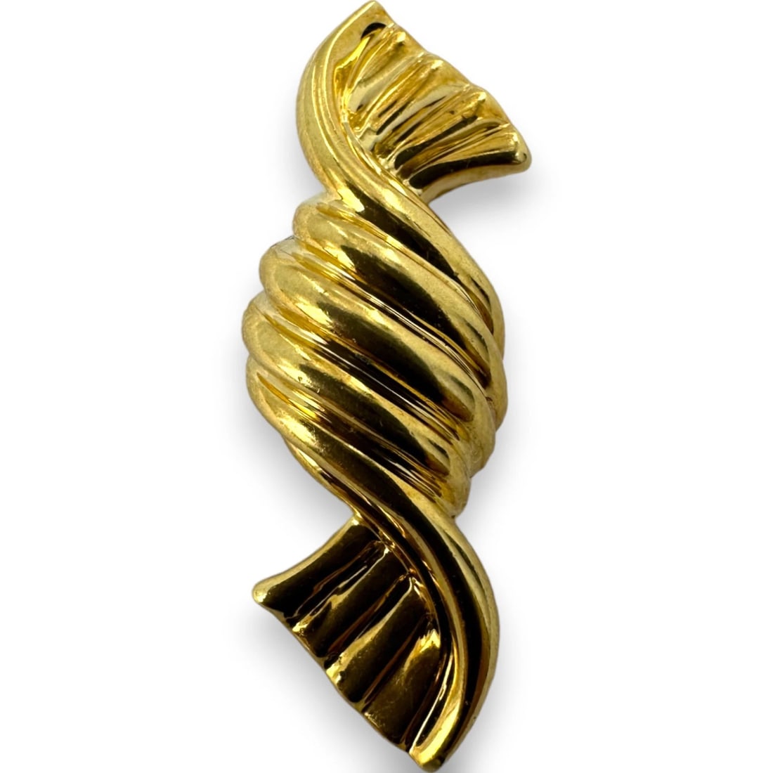 JUDITH LEIBER SOLIDSWIRL CANDY SINGLE EARRING: Judith Leiber SolidSwirl Candy Single Earring Brand: Judith Leiber Type: Earrings Material: 18k Yellow Gold, Color: Yellow Size: Length x Width - 1.1" x 0.4" Accessories: None Accessories