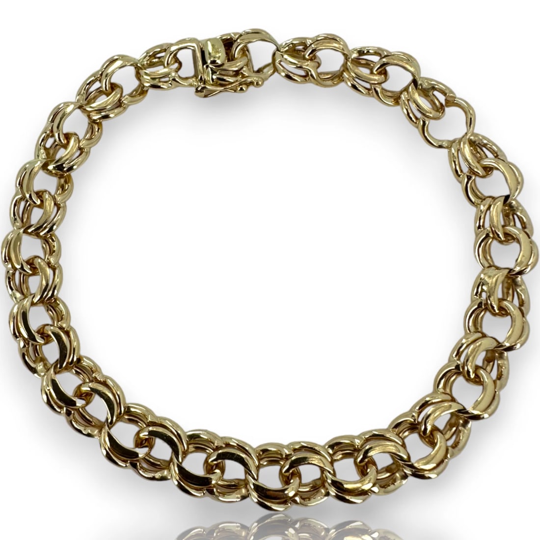 TIFFANY & CO DOUBLE CURB CHARM BRACELET: Tiffany & Co Double Curb Charm Bracelet Brand: Tiffany & Co Type: Bracelet Material: 14kYellow Gold, Color: Yellow Size: Length - 9" Width - 8.9mm Accessories: None Accessories Notice: Whe