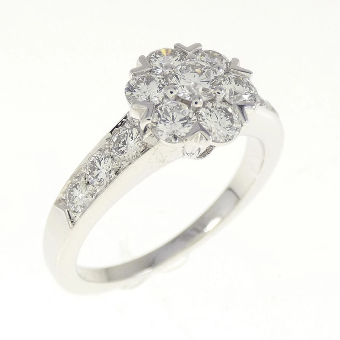 VAN CLEEF & ARPELS FLEURETTE RING: Van Cleef & Arpels Fleurette Ring Brand: Van Cleef & Arpels Type: Ring Material: 750 White Gold, Main Stone Creation Natural Color: None Size: 5 (US size) Accessories: None Accessories Not