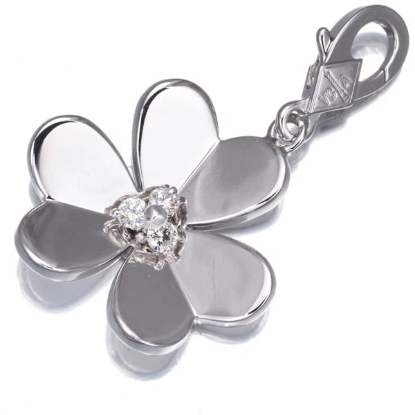 VAN CLEEF & ARPELS PENDANT FRIVOLE LARGE CHARM: Van Cleef & Arpels Pendant Frivole Large Charm Brand: Van Cleef & Arpels Type: Pendant Material: 18K / 750 / White Gold Main Stone Natural Color: White Gold Size: Design size: 22.3 x 20.3mm Acces