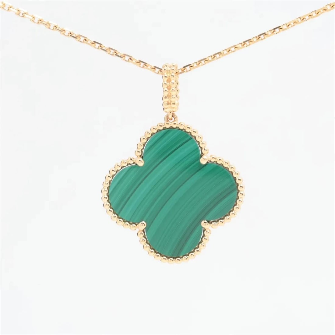 VAN CLEEF & ARPELS MAGIC ALHAMBRA LONG MALACHITE NECKLACE: Van Cleef & Arpels Magic Alhambra Long Malachite Necklace Brand: Van Cleef & Arpels Type: Necklace Material: 750(YG) Color: Not Specified Size: Size(CM) Chain length:90 Accessories: None A