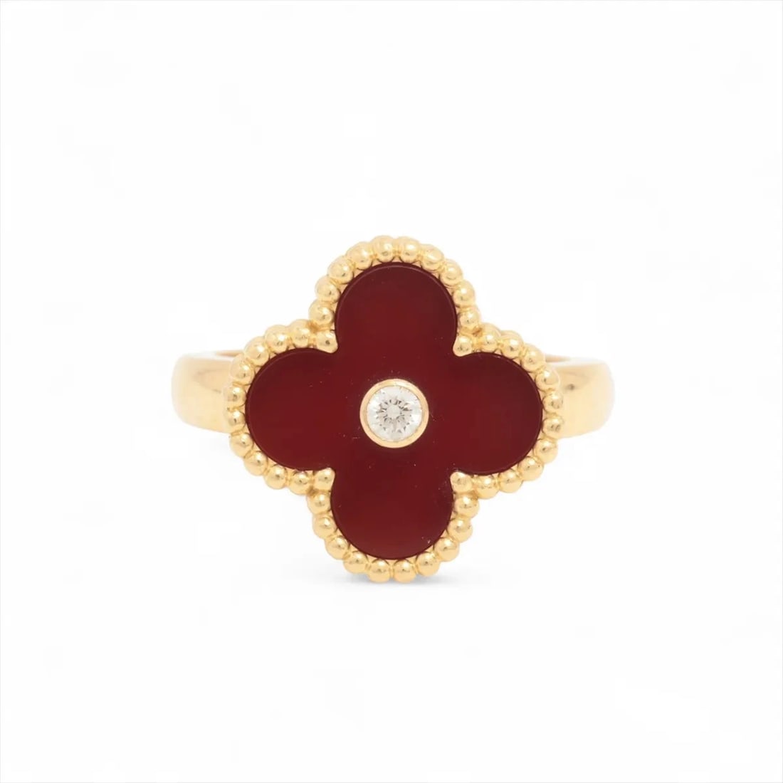 VAN CLEEF & ARPELS VINTAGE ALHAMBRA CARNELIAN DIAMOND RING: Van Cleef & Arpels Vintage Alhambra Carnelian diamond Ring Brand: Van Cleef & Arpels Type: Ring Material: 750(YG) Main Stone Natural Color: Not Specified Size: 5.25 - 5.5 US Accessories: None