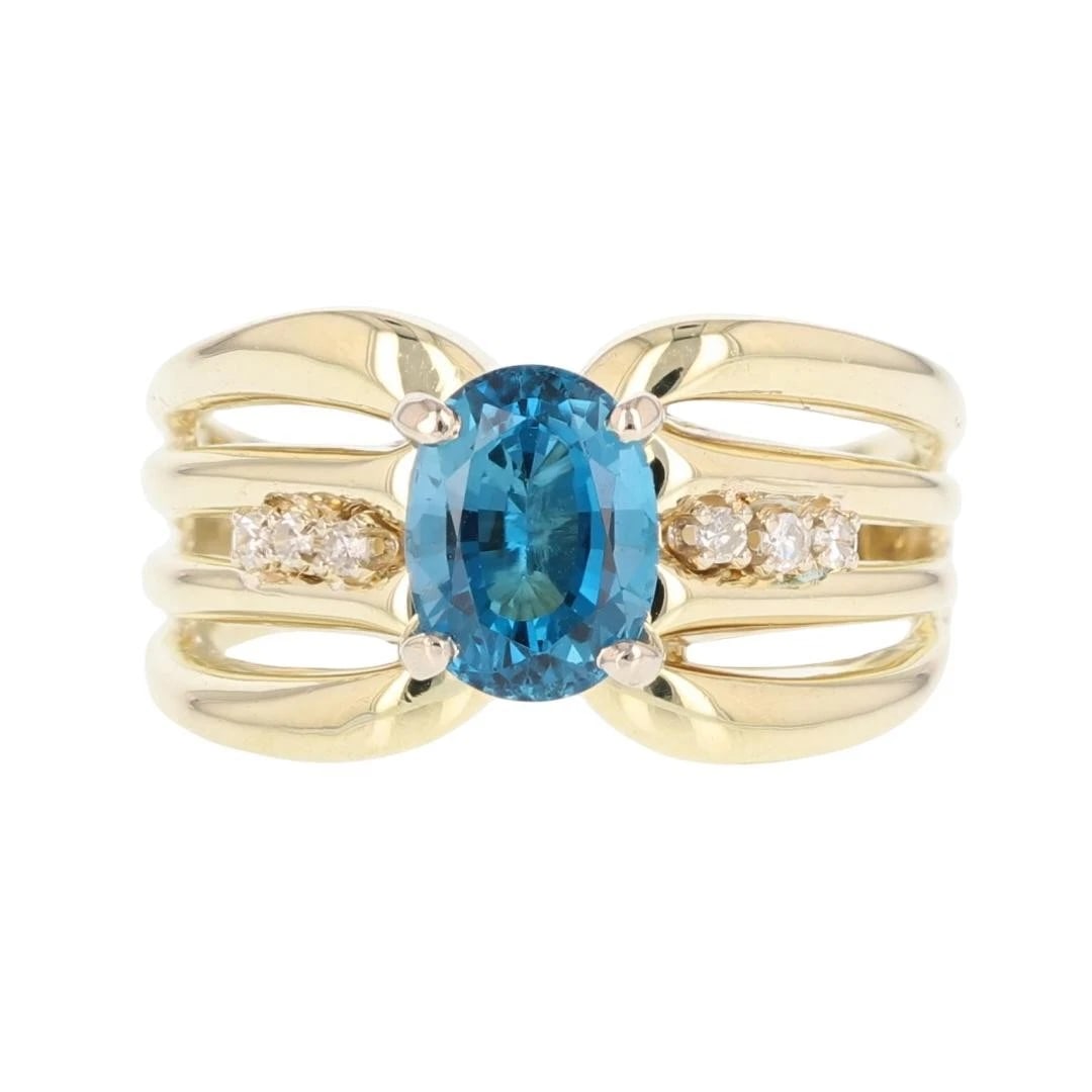 OVAL BLUE TOPAZ W/ DIAMOND RING (1 of 2)
