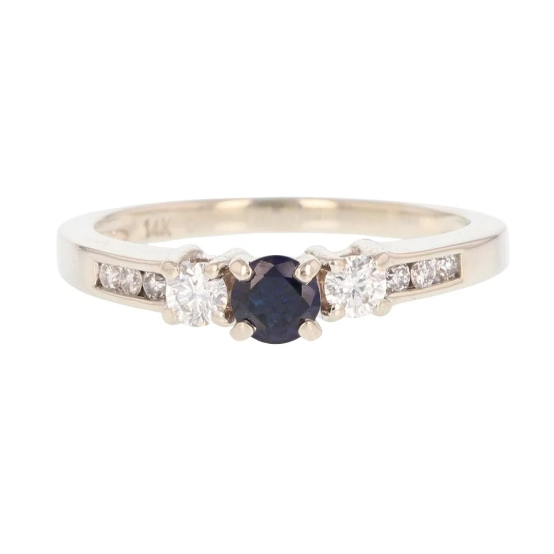 ROUND SAPPHIRE SOLITAIRE W/ DIAMOND ACCENTS RING: Round Sapphire Solitaire w/ Diamond Accents Ring Brand: Unbranded Type: Ring Material: 14k White Gold, Main Stone Natural Color: None Size: 6.5 US Accessories: None Accessories Notice: Whe