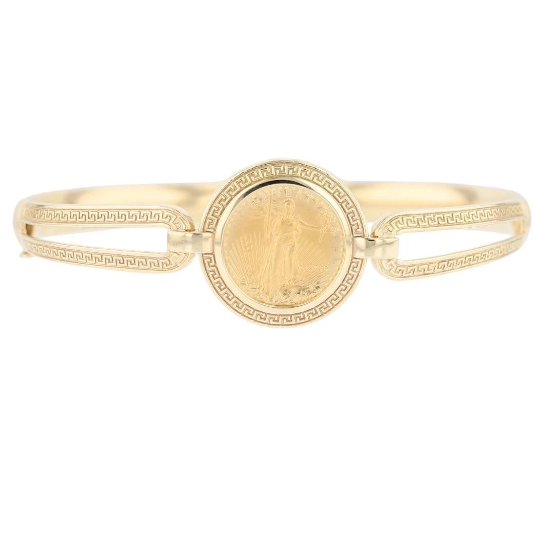 EAGLE GOLD COIN FRAMED BANGLE BRACELET: Eagle Gold Coin Framed Bangle Bracelet Brand: Unbranded Type: Bracelet Material: 14k Yellow Gold, Color: None Size: Bracelet Measurement: 7.5" x 21.4mm Accessories: None Accessories Notice