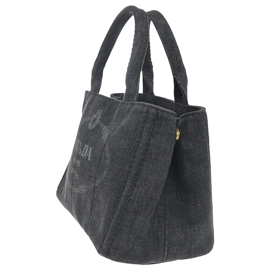 PRADA MILANO LOGO CANAPA TOTE HAND BAG DENIM LEATHER BLACK GOLD: PRADA Milano Logo CANAPA Tote Hand Bag Denim Leather Black Gold Brand: PRADA Type: Hand Bag Material: Canvas Color: Black Size: W 11.4 x H 6.7 x D 5.9 " (approx.) HANDLE DROP ( inch /cm ) 4.7 "/ 1