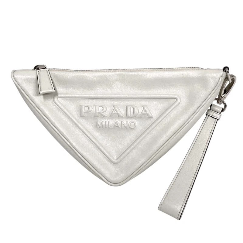 PRADA TRIANGLE POUCH CLUTCH BAG: PRADA Triangle Pouch Clutch bag Brand: PRADA Type: Clutch bag Material: Nappa leather Color: Ivory Size: W10.6 x H5.9x D2.0inch Accessories: None Accessories Notice: When purchasing pre-ow