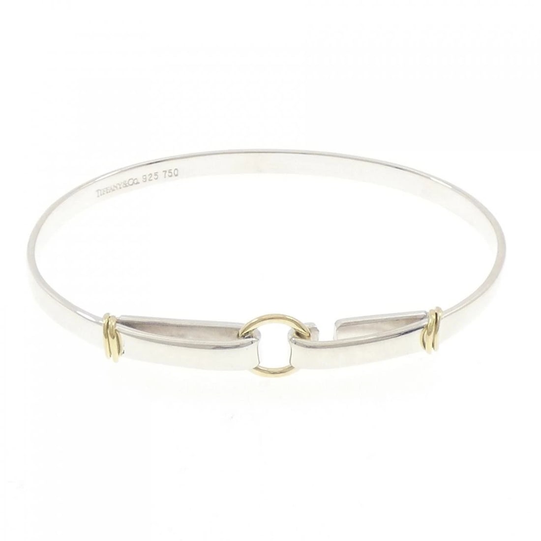 TIFFANY & CO. 925 750YG BANGLE: Tiffany & Co. 925 750YG Bangle Brand: Tiffany Type: Bracelet Material: 925 Silver 750 Yellow Gold, Color: Silver Yellow Gold Size: 17cm ActualSize Max W: 8.9mm Accessories: None Accessorie