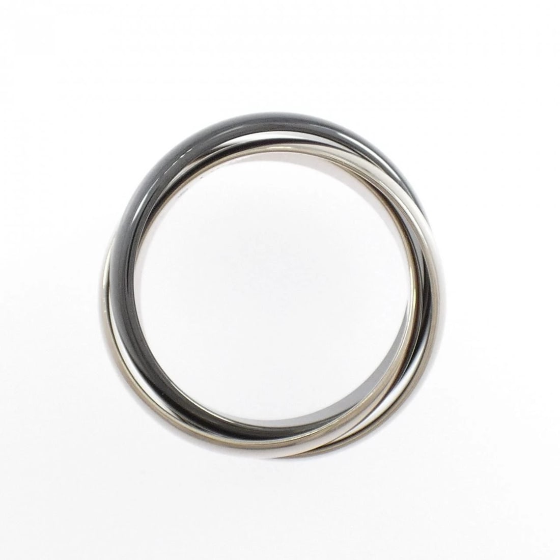 CARTIER TRINITY BLACK & WHITE RING: Cartier Trinity Black & White Ring Brand: Cartier Type: Ring Material: 750 White Gold ceramic, Color: White Gold ceramic Size: 7.5-8 (US size) Accessories: None Accessories Notice: When pu
