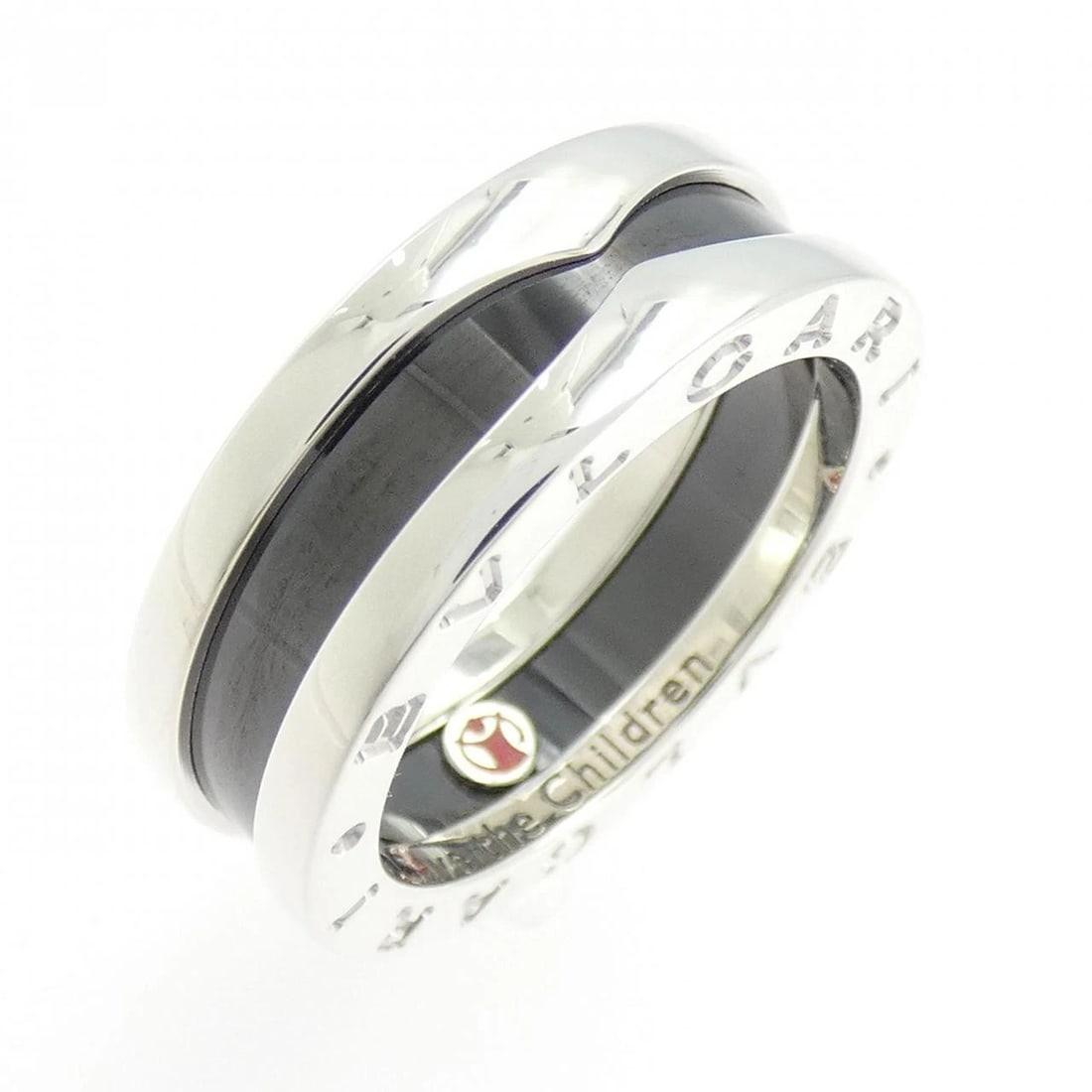 BVLGARI SAVE THE CHILDREN RING: BVLGARI Save the Children Ring Brand: BVLGARI Type: Ring Material: 925 Silver ceramic, Main Stone (Resin) Color: Silver Size: 6-6.5 (US size) Accessories: None Accessories Notice: When pur