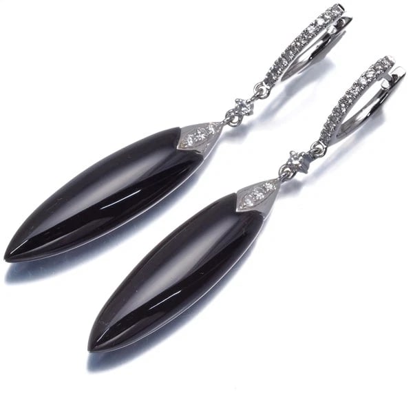 ONYX DIAMOND EARRINGS: Onyx Diamond Earrings Brand: Unbranded Type: Earrings Material: 18K / 750 / White Gold Color: White Gold Size: Design size: 50.7 x 8.0mm Accessories: None Accessories Notice: When purchasing