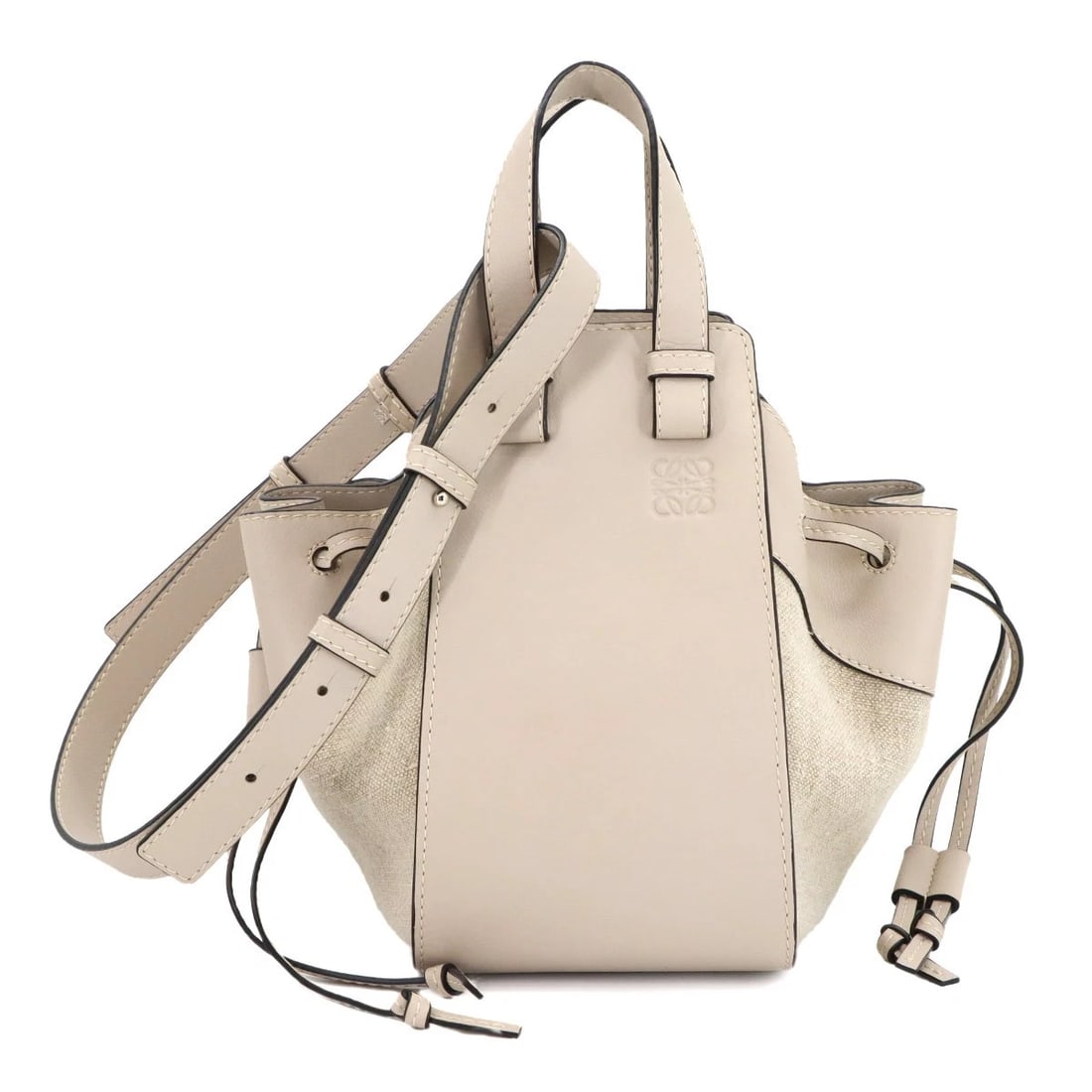 LOEWE HAMMOCK DRAWSTRING SMALL HAND SHOULDER BAG: LOEWE Hammock Drawstring Small Hand Shoulder Bag Brand: LOEWE Type: Hand Bag / Shoulder Bag Material: Leather , Canvas Color: Beige Size: W 5.31 inch, H 9.65 inch, D 9.84 inch Handle 8.7inch (22cm