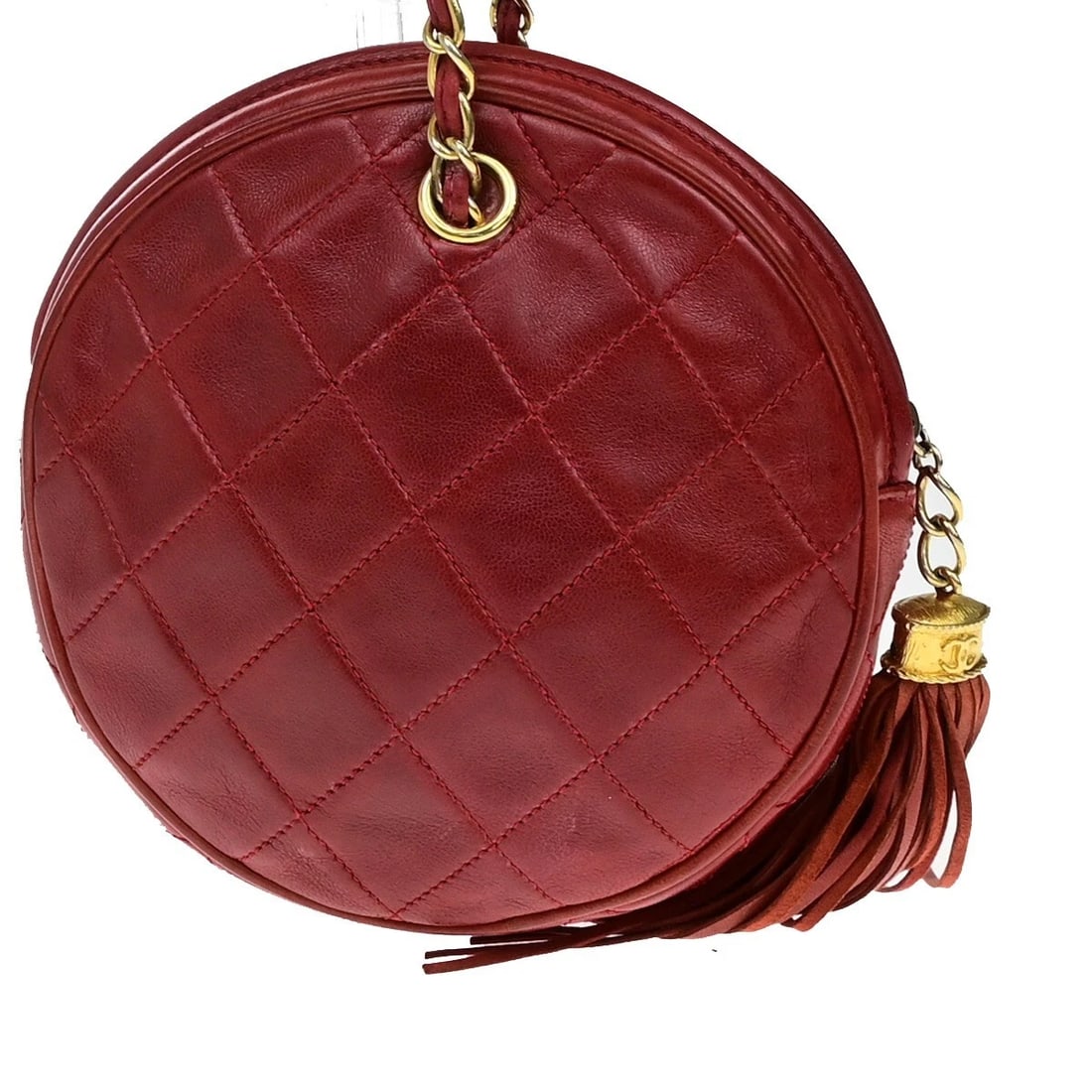 CHANEL CC LOGO MATELASSE TASSEL ROUND CHAIN HAND BAG: CHANEL CC Logo Matelasse Tassel Round Chain Hand Bag Brand: CHANEL Type: Hand Bag Material: Leather Color: Red Size: W 6.3 x H 6.3 x D 1.2 " (approx.) HANDLE DROP ( inch /cm ) 1.2 "/ 3 cm