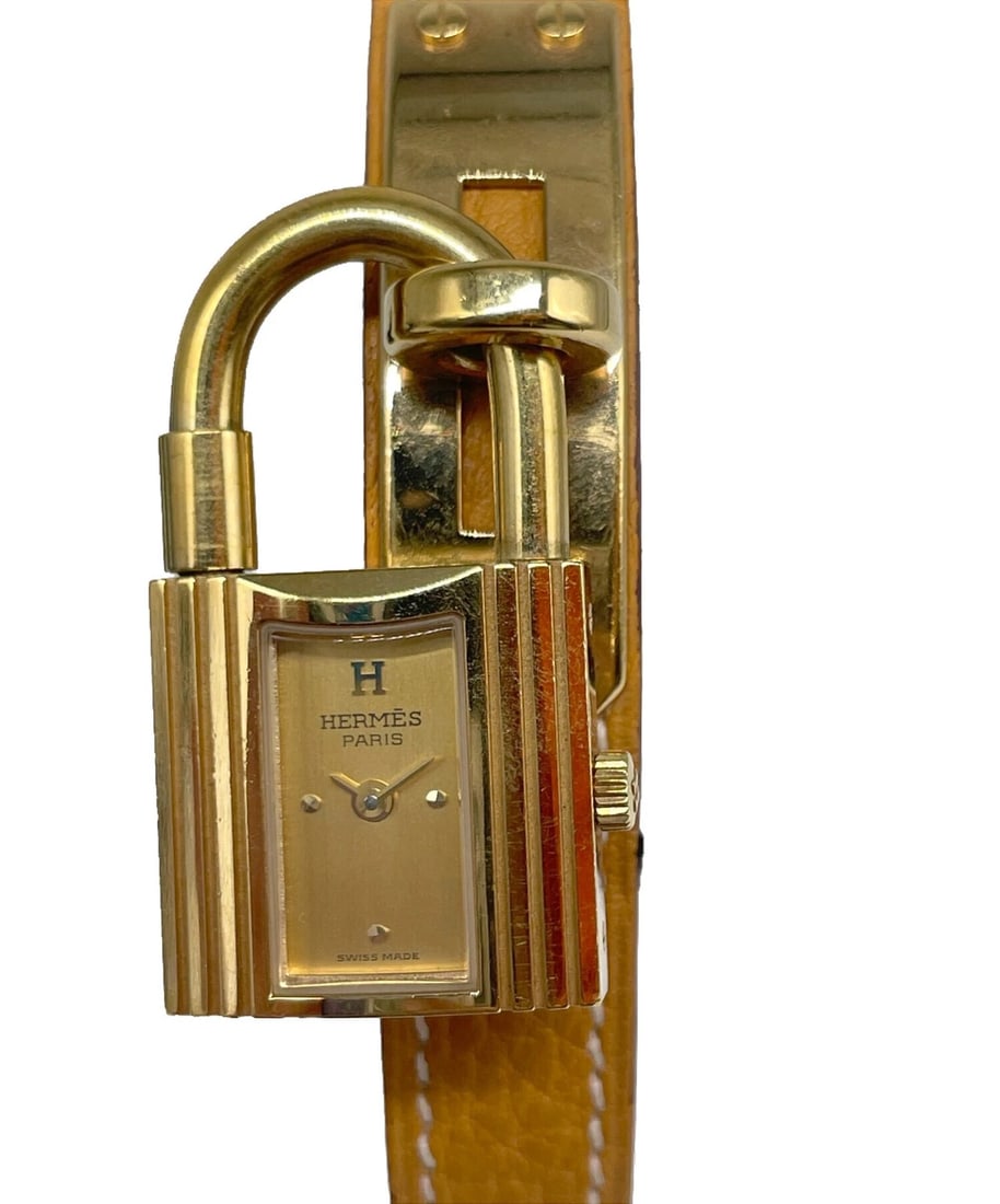 HERMES KELLY WATCH WATCH: HERMES Kelly Watch Watch Brand: HERMES Type: Wrist watch Material: Band Material Leather belt, Case Material SS Color: Dial Color Champagne Dial Size: Case size [ Minimum Wrist Size] 13.5cm [