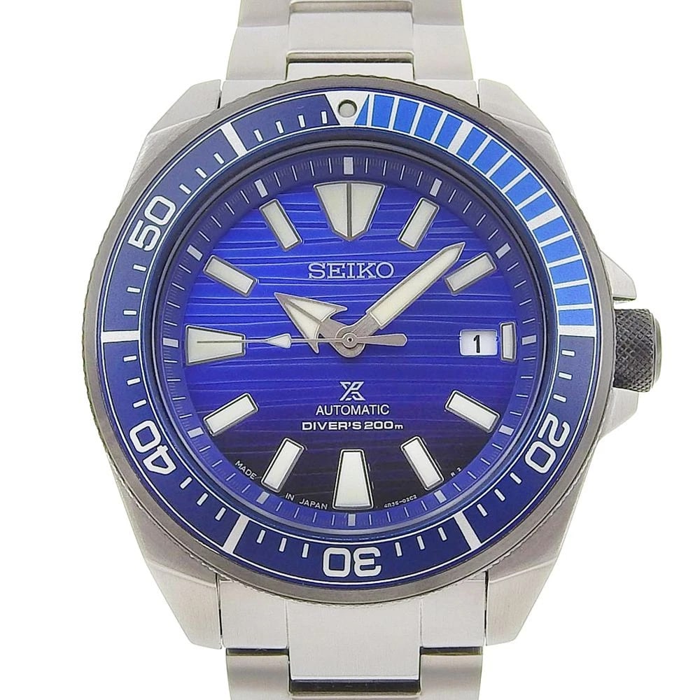 SEIKO PROSPEX SAMURAI SS WATCH: SEIKO Prospex Samurai SS Watch Brand: SEIKO Type: Wrist watch Material: Band Material SS, Case Material SS Color: Dial Color Blue Size: Case size Bezel Color Silver Dial Color Blue Accessories: N
