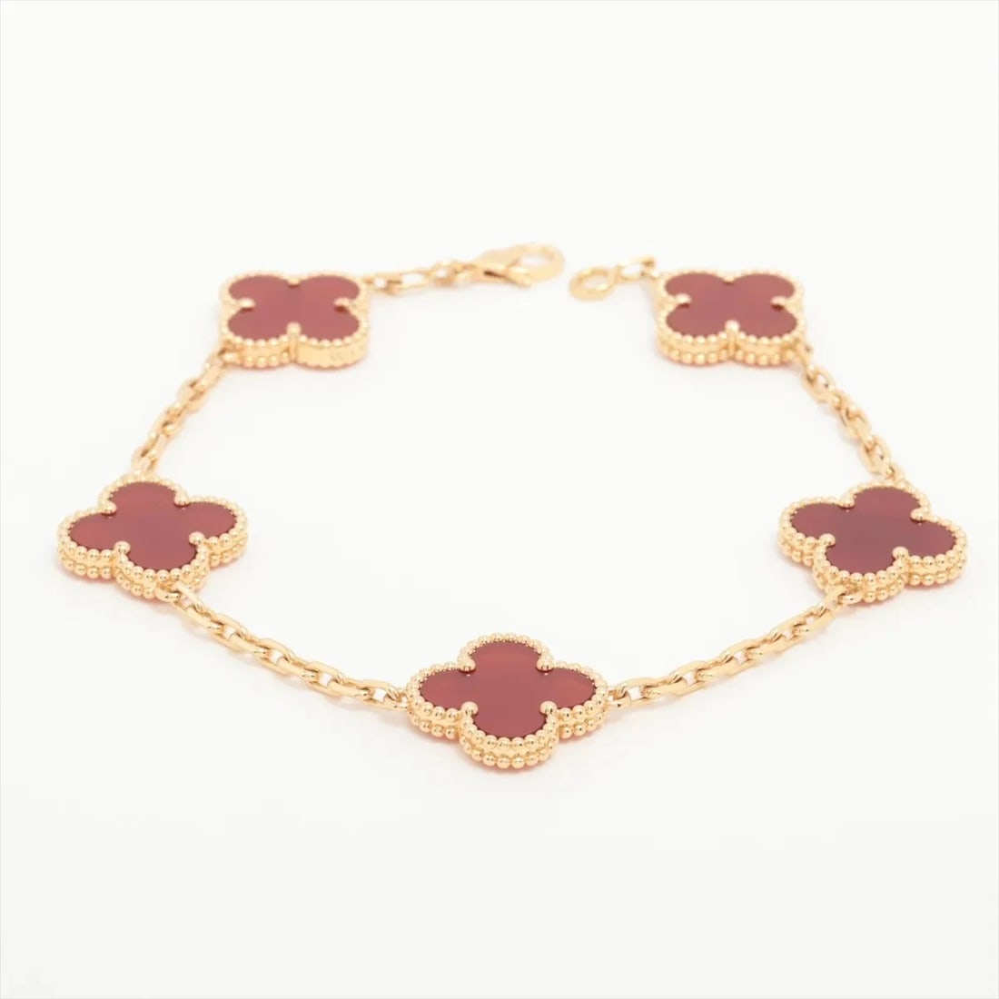 VAN CLEEF & ARPELS VINTAGE ALHAMBRA 5P CARNELIAN BRACELET: Van Cleef & Arpels Vintage Alhambra 5P Carnelian Bracelet Brand: Van Cleef & Arpels Type: Bracelet Material: 750(YG) Color: Not Specified Size: Size(CM) Bracelet length:20 Accessories: None