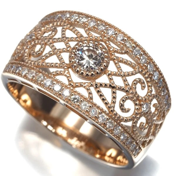 DIAMOND OPENWORK RING: Diamond Openwork Ring Brand: Unbranded Type: Ring Material: 18K / 750 / Rose Gold Main Stone Natural Color: Rose Gold Size: US7 Accessories: None Accessories Notice: When purchasing pre-ow