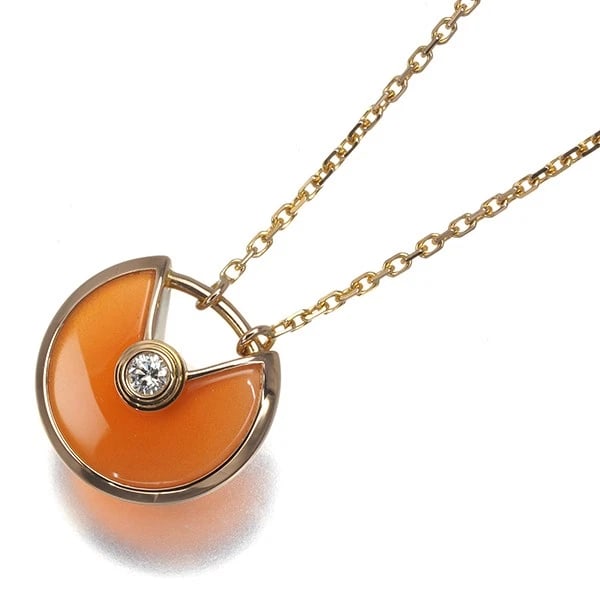CARTIER NECKLACE CARNELIAN AMULETTE: Cartier Necklace Carnelian Amulette Brand: Cartier Type: Necklace Material: 18K / 750 / Rose Gold Color: Rose Gold Size: Necklace length: 38 / 41cm Accessories: None Accessories Notice: When
