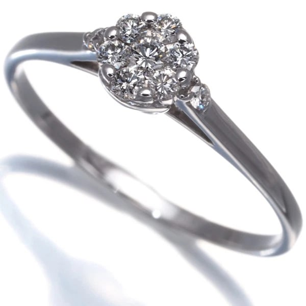 DIAMOND FLOWER RING: Diamond Flower Ring Brand: Unbranded Type: Ring Material: 18K / 750 / White Gold Main Stone Natural Color: White Gold Size: US7 Accessories: None Accessories Notice: When purchasing pre-owned