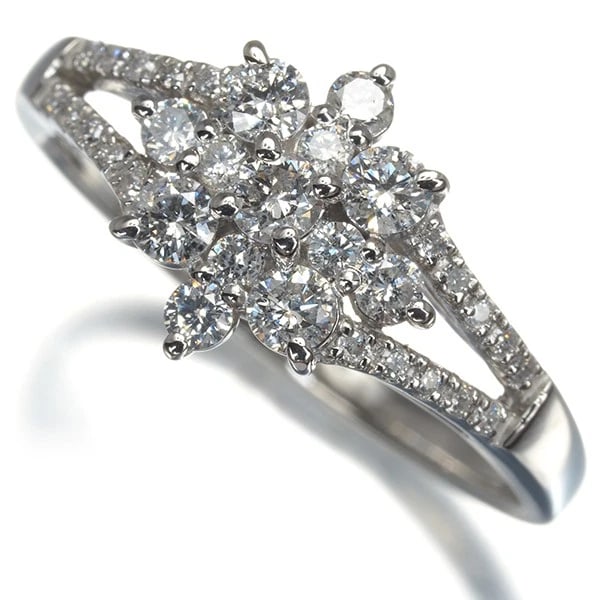 DIAMOND FLOWER RING: Diamond Flower Ring Brand: Unbranded Type: Ring Material: 900 / Platinum Main Stone Natural Color: Platinum Size: US6 - 6.25 Accessories: None Accessories Notice: When purchasing pre-owned