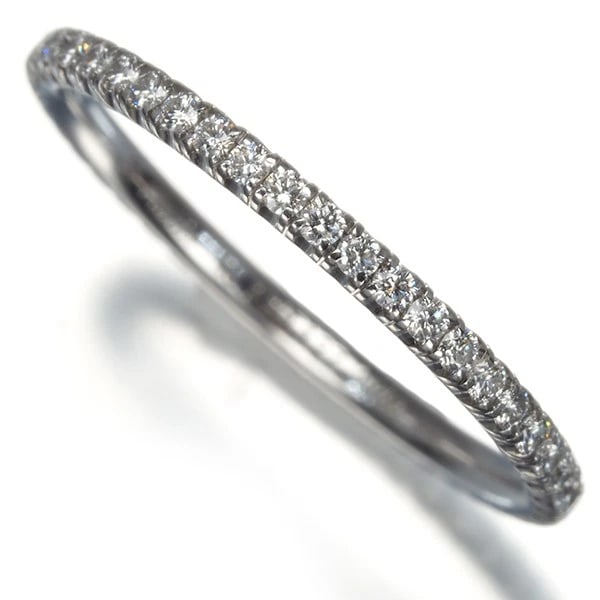 CARTIER RING ETINCELLE FULL ETERNITY: Cartier Ring Etincelle Full Eternity Brand: Cartier Type: Ring Material: 18K / 750 / White Gold Main Stone Natural Color: White Gold Size: US4.75 Accessories: None Accessories Notice: When