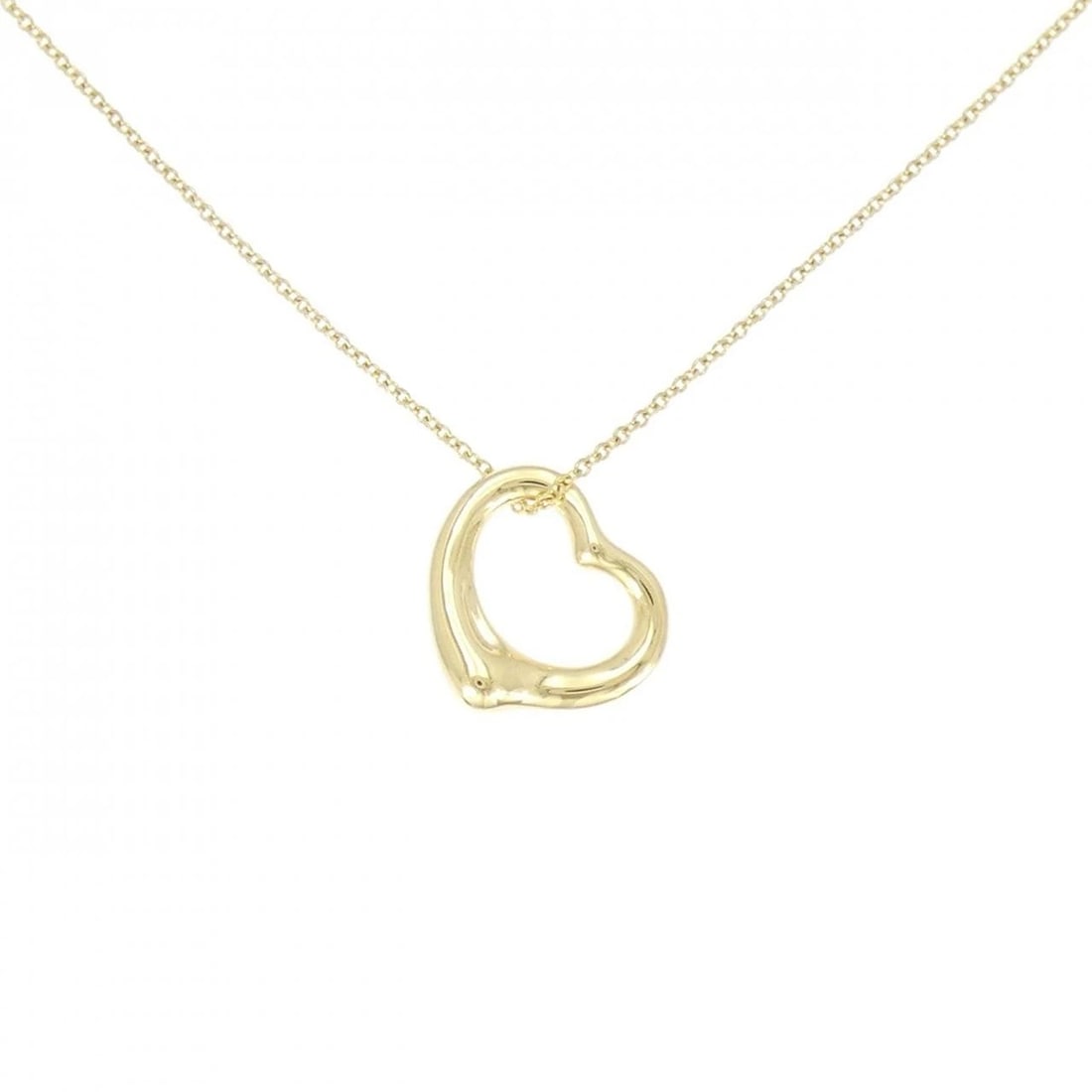 TIFFANY & CO. OPEN HEART NECKLACE: Tiffany & Co. Open Heart Necklace Brand: Tiffany Type: Necklace Material: 750 Yellow Gold Color: Yellow Gold Size: 41cm Accessories: None Accessories Notice: When purchasing pre-owned goods,
