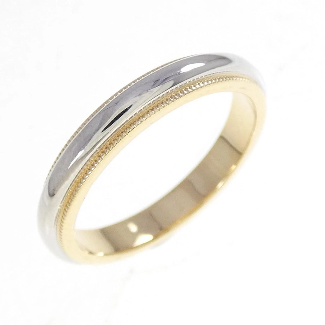 TIFFANY & CO. MILGRAIN RING: Tiffany & Co. Milgrain Ring Brand: Tiffany Type: Ring Material: 750 Yellow Gold Platinum 950 Color: Yellow Gold Platinum Size: 8-8.5 (US size) Accessories: None Accessories Notice: When