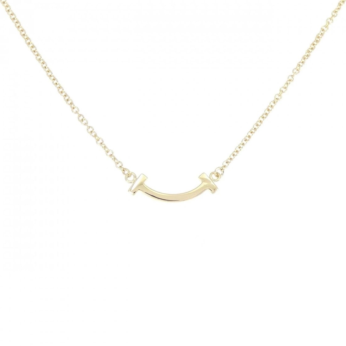 TIFFANY T SMILE MINI NECKLACE: Tiffany T Smile mini Necklace Brand: Tiffany Type: Necklace Material: 750 Yellow Gold Color: Yellow Gold Size: 41/46cm Accessories: None Accessories Notice: When purchasing pre-owned goods,