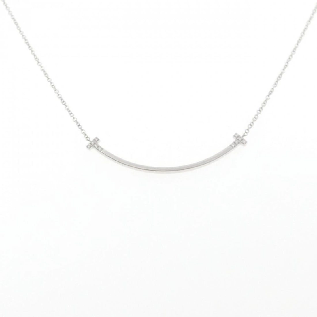 TIFFANY T SMILE SMALL NECKLACE: Tiffany T Smile Small Necklace Brand: Tiffany Type: Necklace Material: 750 White Gold Main Stone Natural Color: White Gold Size: 40cm-45cm Accessories: None Accessories Notice: When