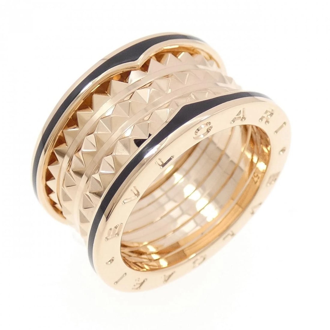 BVLGARI B.ZERO1 LOCK 4 BANDS RING: BVLGARI B.zero1 lock 4 Bands Ring Brand: BVLGARI Type: Ring Material: 750 Pink Gold ceramic Color: Pink Gold ceramic Size: 8-8.5 (US size) Accessories: None Accessories Notice: When