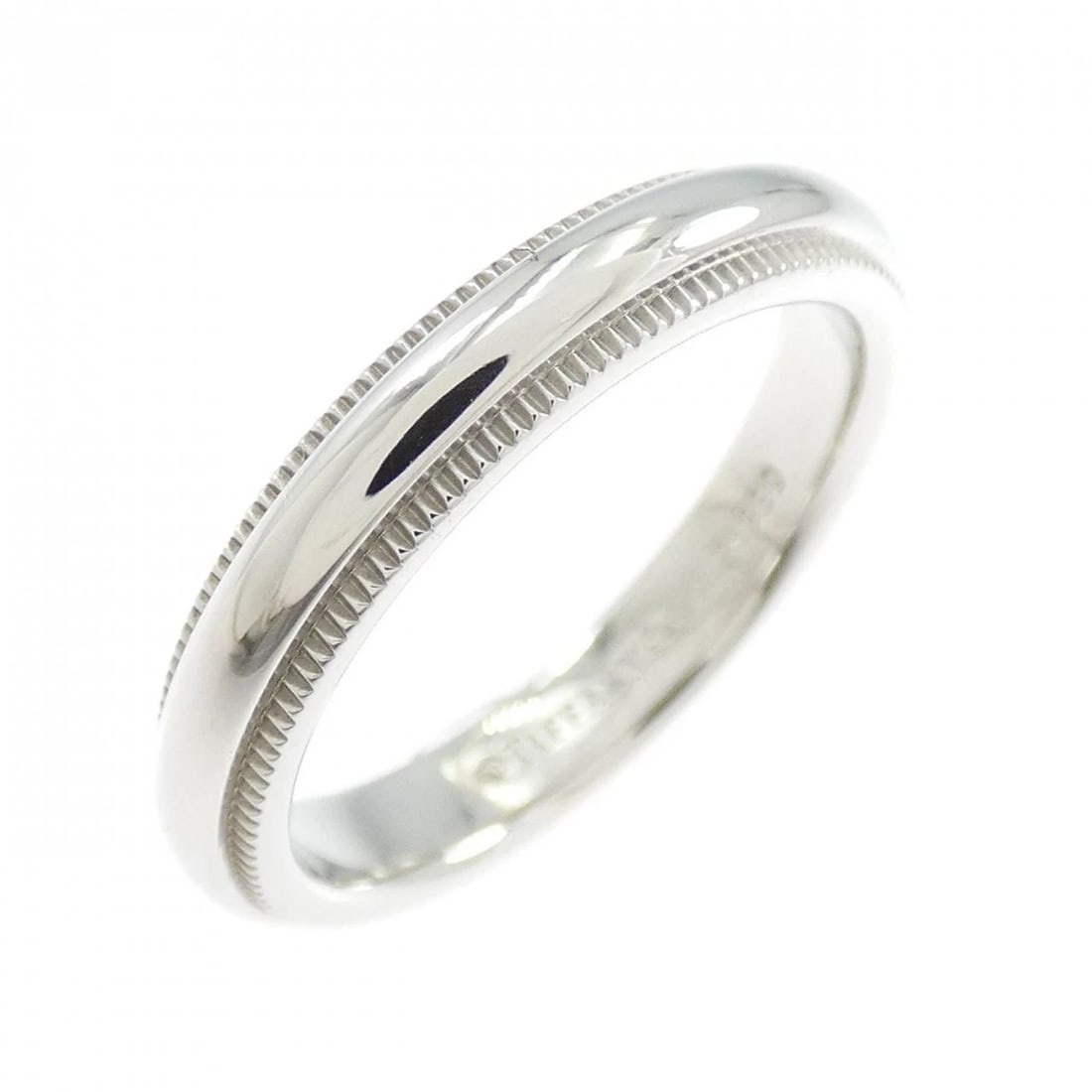 TIFFANY & CO. MILGRAIN RING: Tiffany & Co. Milgrain Ring Brand: Tiffany Type: Ring Material: Platinum 950 Color: Platinum Size: 4 (US size) Accessories: None Accessories Notice: When purchasing pre-owned goods, please