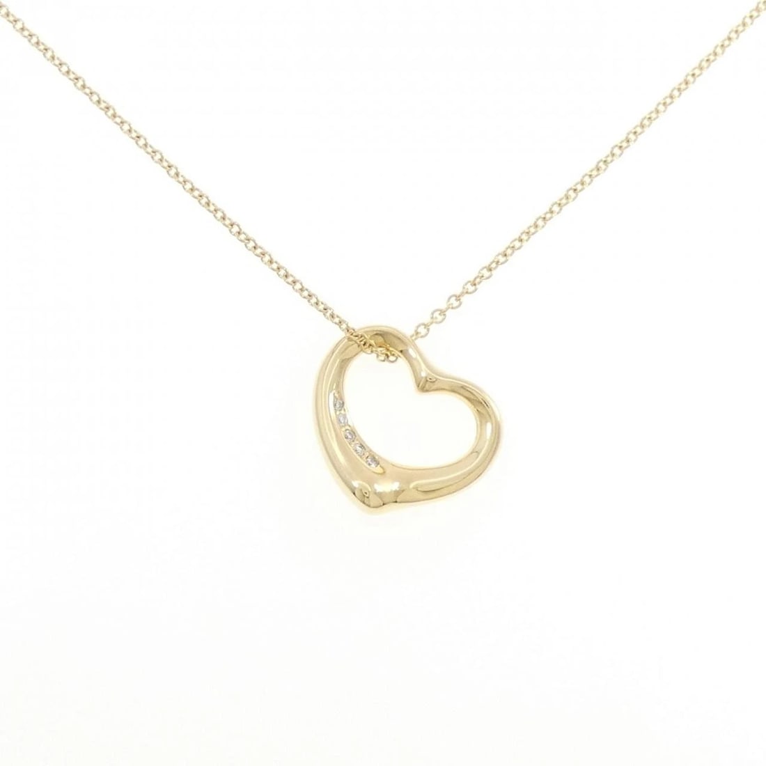 TIFFANY & CO. OPEN HEART NECKLACE: Tiffany & Co. Open Heart Necklace Brand: Tiffany Type: Necklace Material: 750 Yellow Gold Main Stone Natural Color: Yellow Gold Size: 41cm Accessories: None Accessories Notice: When