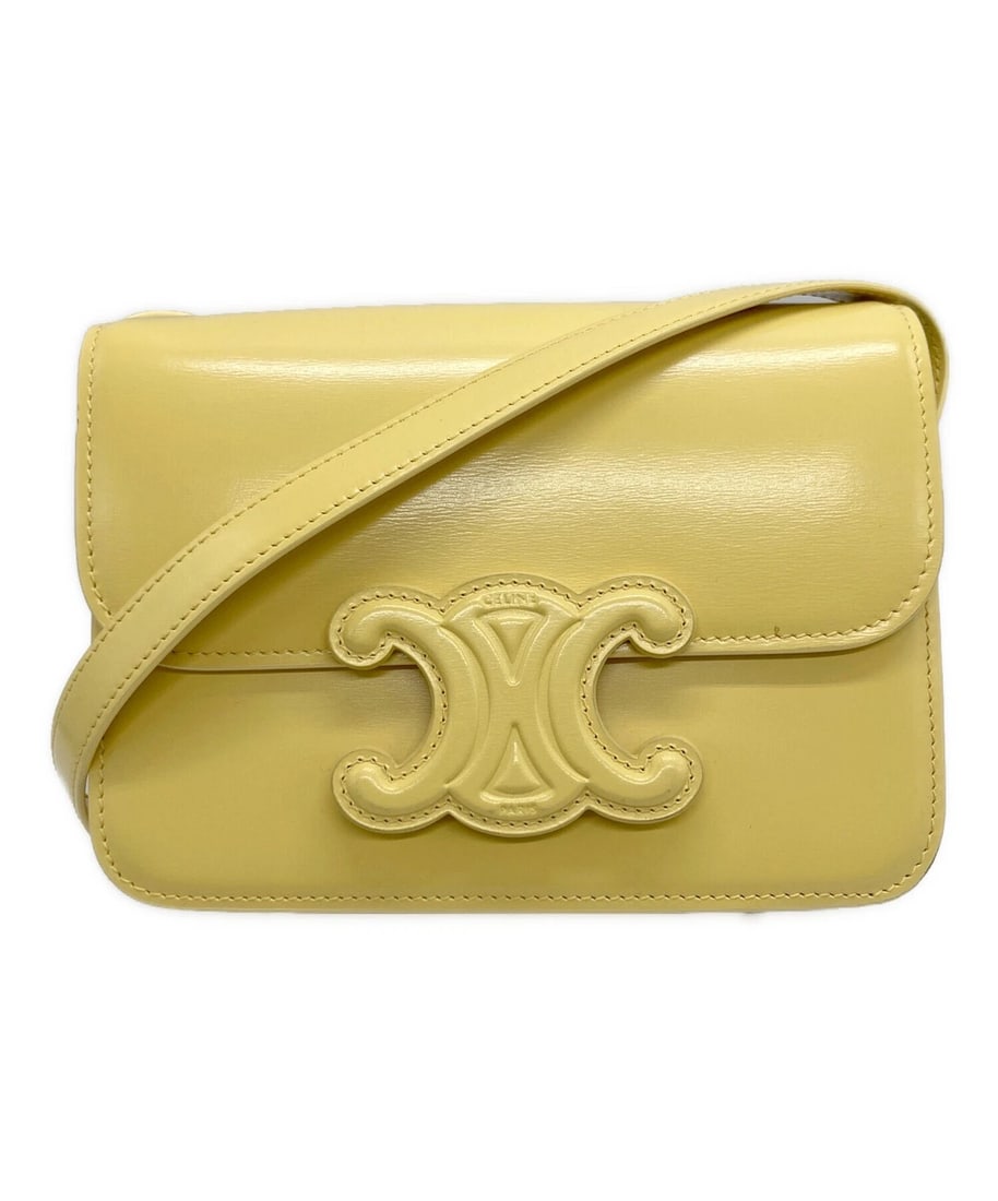 CELINE CLASSIC CUIR TRIOMPHE BAG: CELINE Classic Cuir Triomphe Bag Brand: CELINE Type: Handbag Material: none Color: Yellow Size: H:14.0cm / W:18.0cm / D:6.0cm Accessories: None Accessories Notice: When purchasing pre-owned