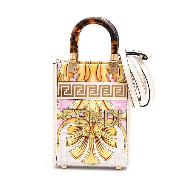 FENDI FENDACE SUNSHINE MINI SHOPPER MULTI: Fendi Fendace Sunshine Mini Shopper Multi Brand: FENDI Type: Handbag Material: Exterior Material Pvc Color: Exterior Color Ivory X Multicolor Size: W:13cm x H:17.5cm x D:5.5cm [ Strap or